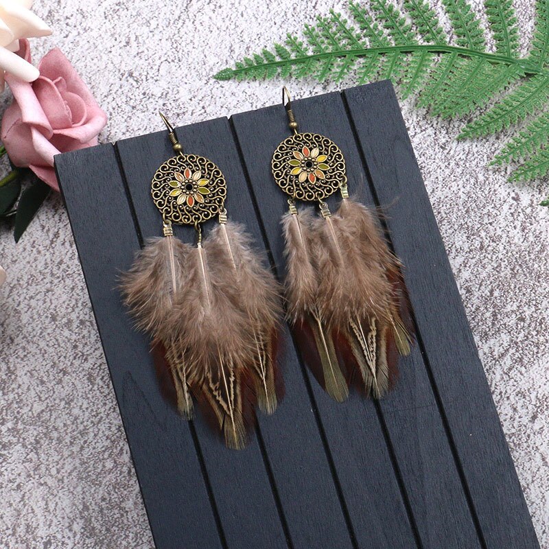 Leopard feather earrings top